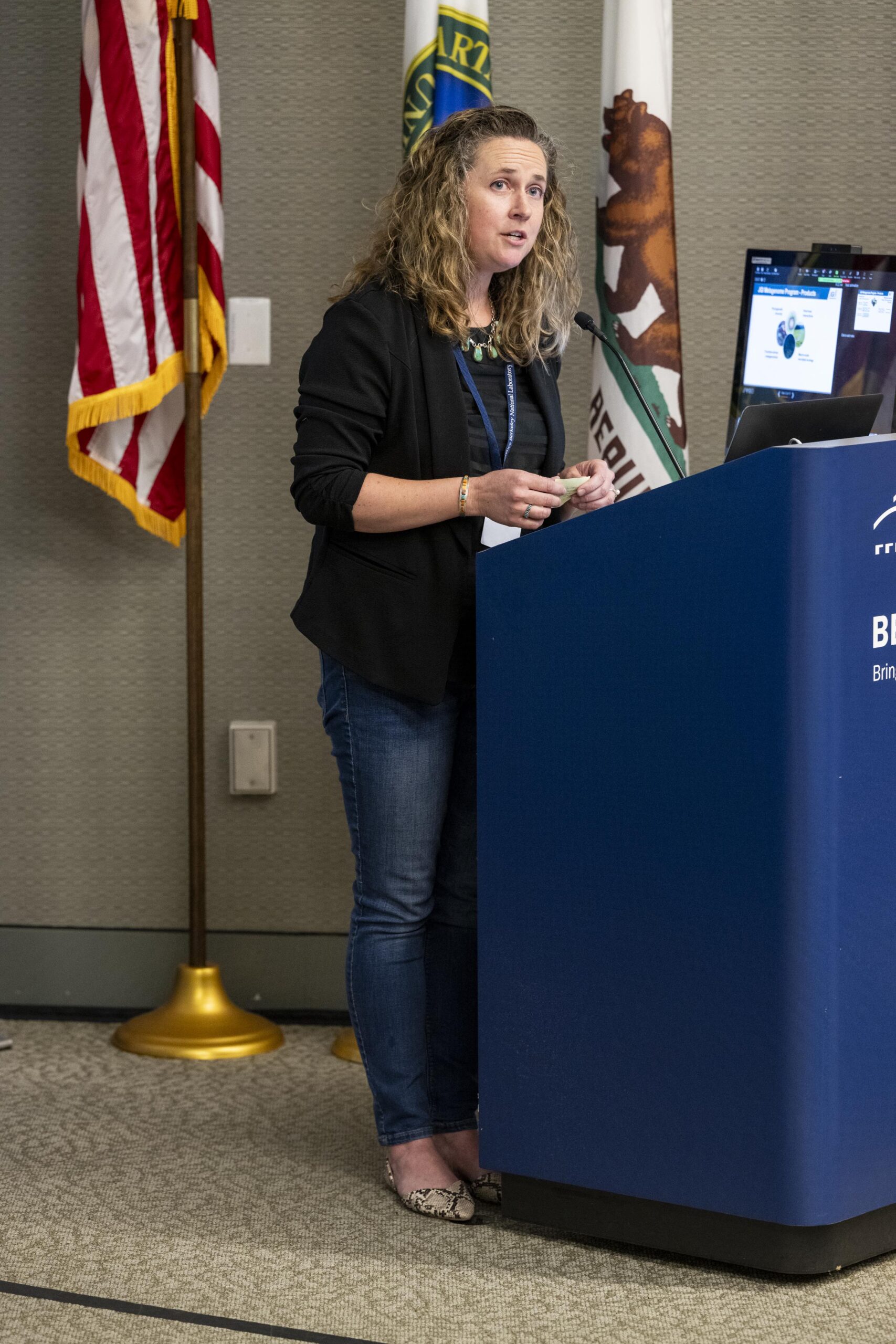 a person speaking at a podium