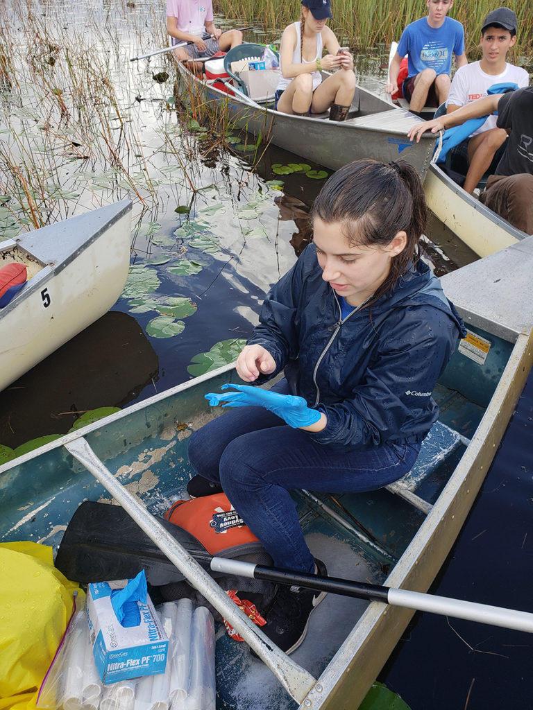 people in boats