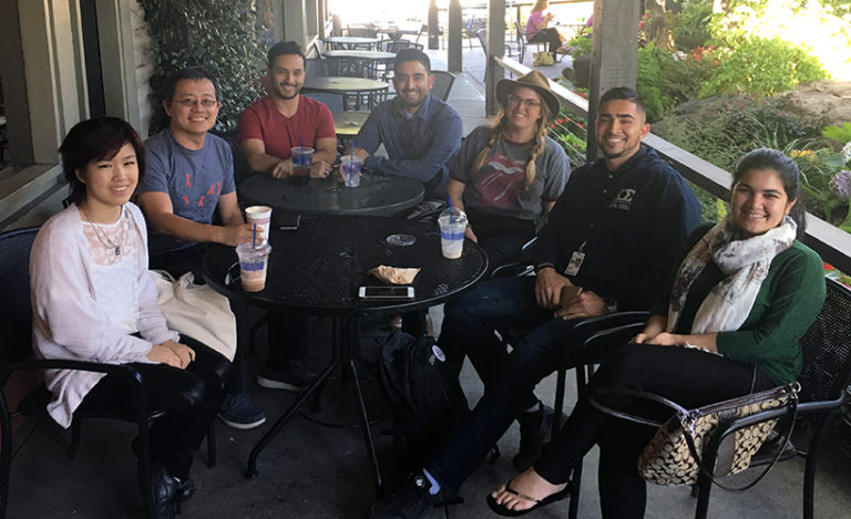 a group shot of people having coffee