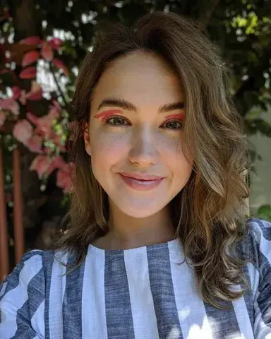 An intern posing for a headshot