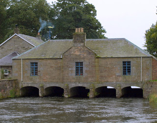 Scotland’s Leslie paper mill controls the water entering the Leven river through the Loch Leven Sluice House. (Image by Brian Forbes via Flickr/Creative Commons)