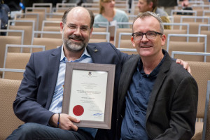 Phil Hugenholtz (right) presented the Van Niel Prize to Nikos Kyrpides (left)