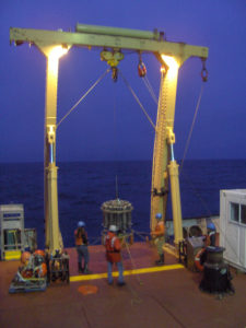 CTD Rosette in use along the Line P transect. A CTD is used to profile a water column from surface to bottom by measuring conductivity (a proxy for salinity), temperature, and depth. (Jody Wright)