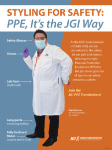 Masked male poses with lab personal protective equipment (PPE)