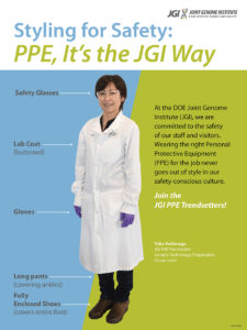 Female wearing lab personal protective equipment (PPE)
