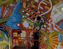Nigel Sussman painting the JGI mural in timelapse footage